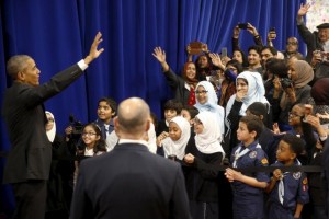 Obama waves farewell to students after his remarks at the Islamic Society of Baltimore mosque in Catonsville, Maryland